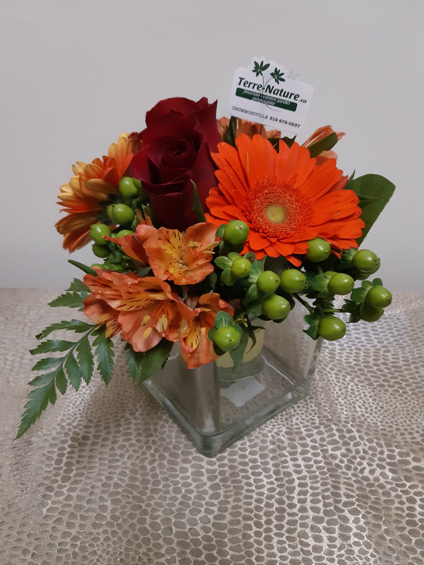Bouquet dans les tons de rouge et orange
