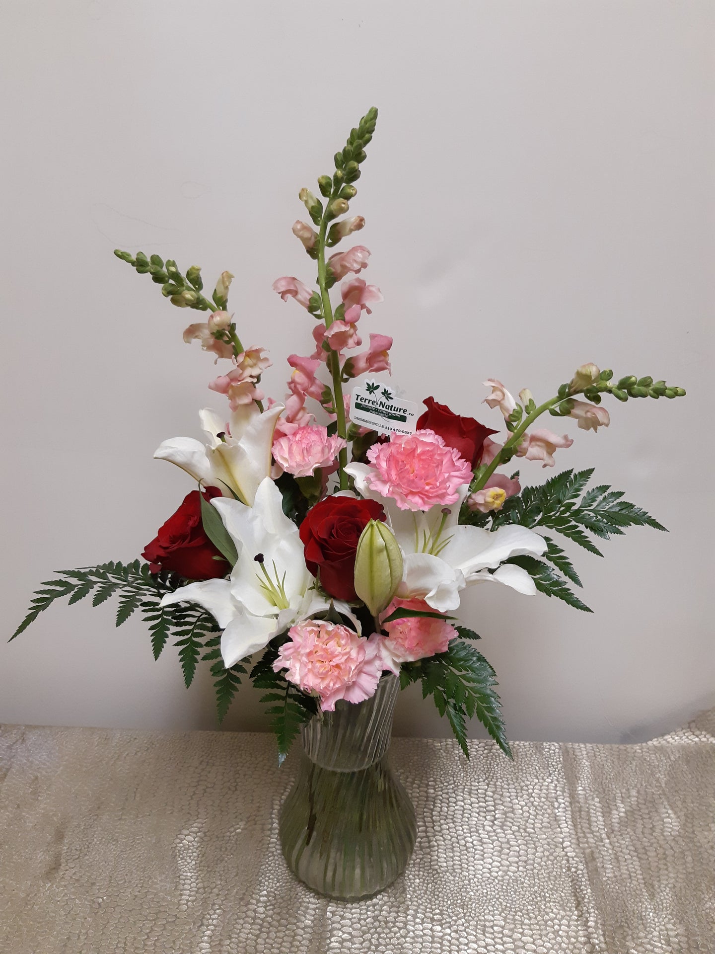 Bouquet dans les tons de rose et blanc