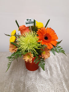 Bouquet aux couleurs chaudes avec Gerberas et Roses