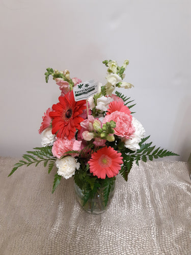Bouquet dans les tons de rose et blanc