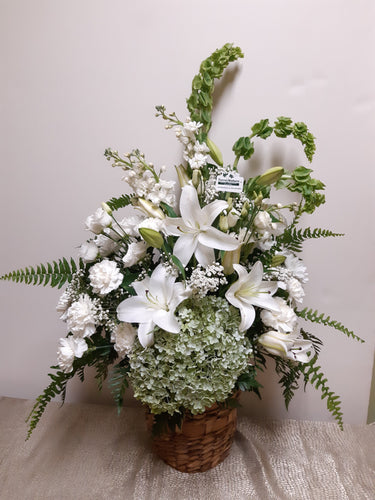 Arrangement floral funéraire tout en blanc