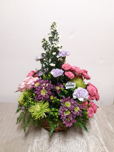 Spectaculaire arrangement floral funéraire aux couleurs vives