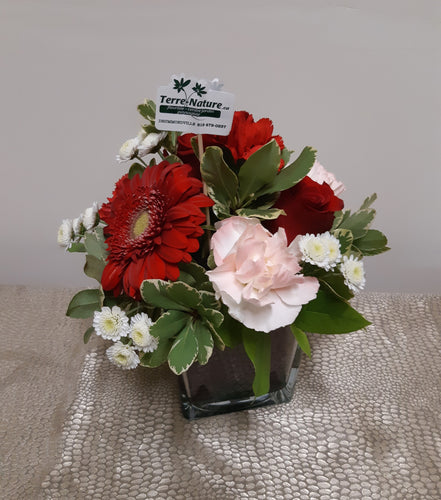 Bouquet avec Gerberas et Roses dans les tons de rouge, blanc et rose